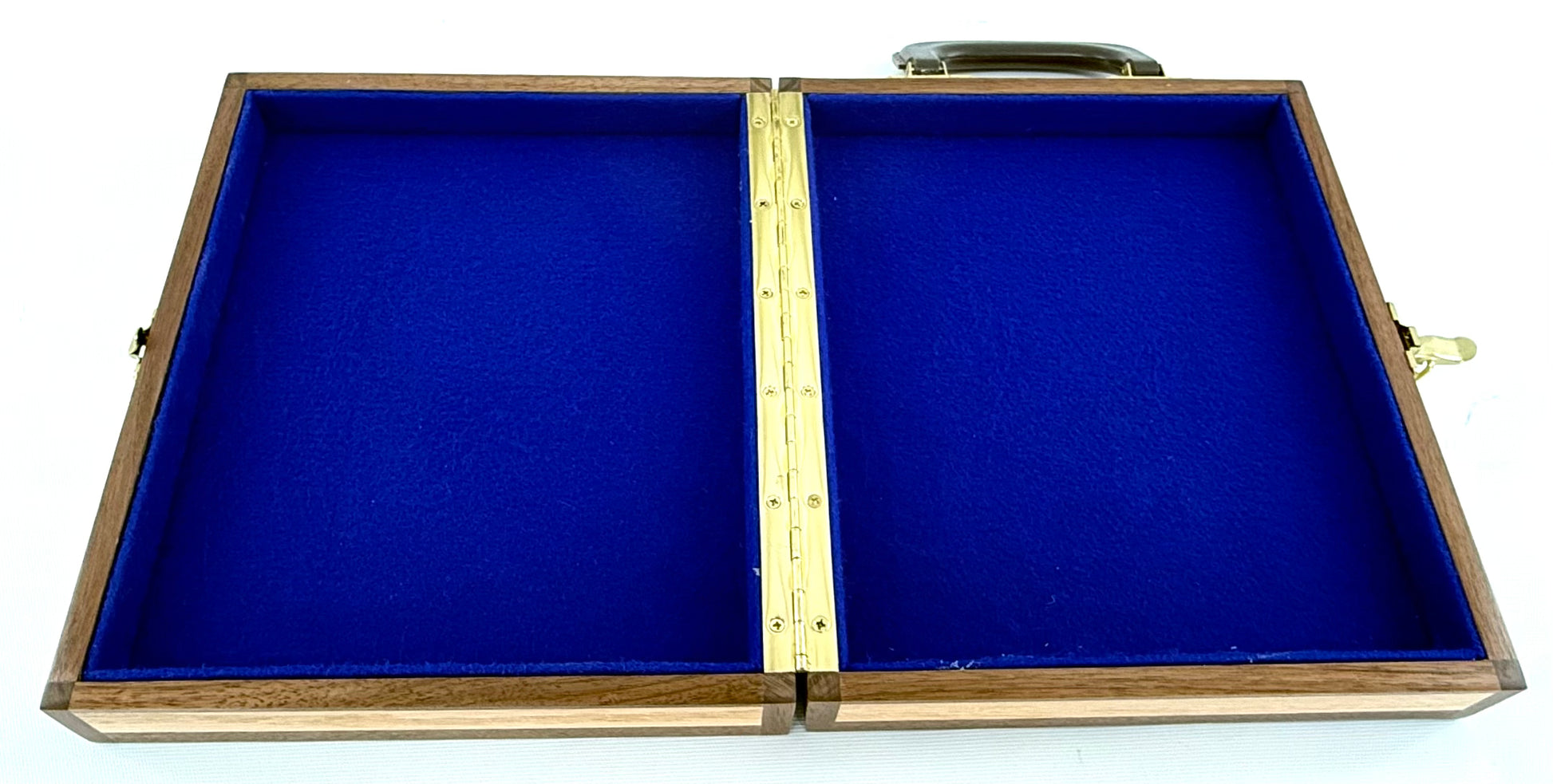 An open wooden Navy vessel presentation case with a vibrant royal blue felt interior lining and a central brass hinge, photographed against a solid white background.